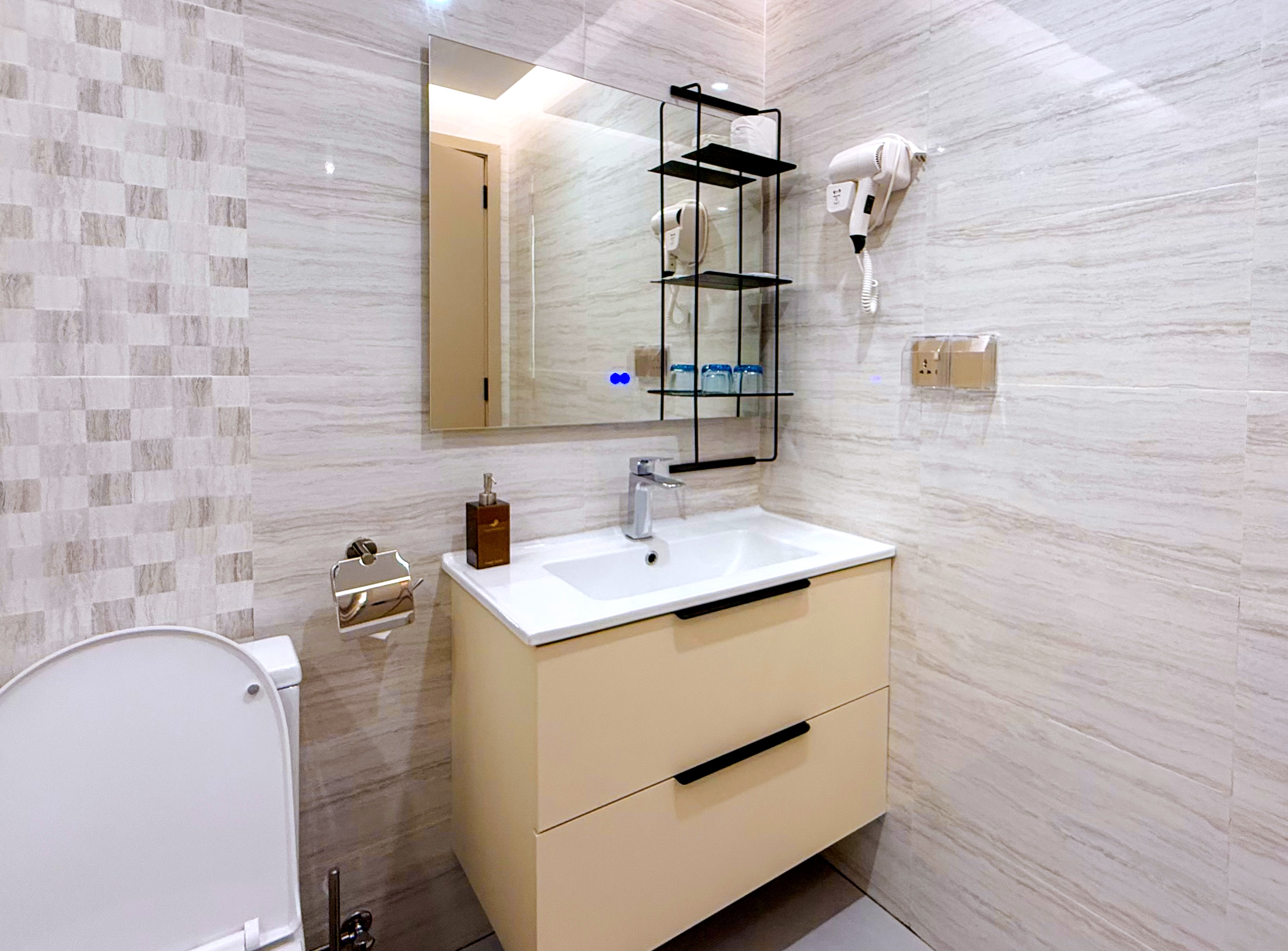 Comfortable bed in Double Deluxe Room